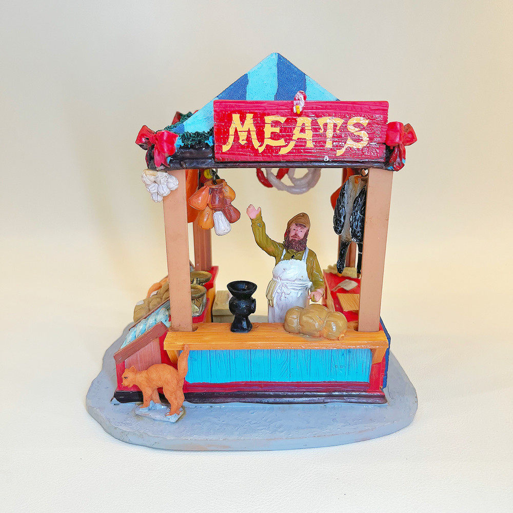 Vintage Collectible Market - Figurine en résine représentant un stand